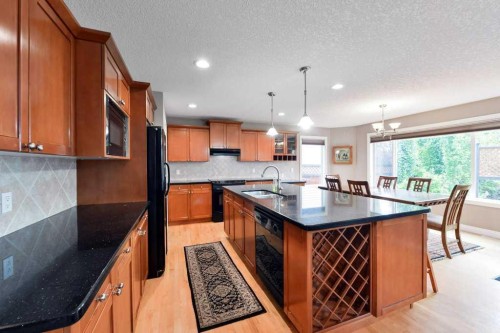 6 Royal Birkdale Court Nw, Calgary, AB - Indoor Photo Showing Kitchen With Upgraded Kitchen