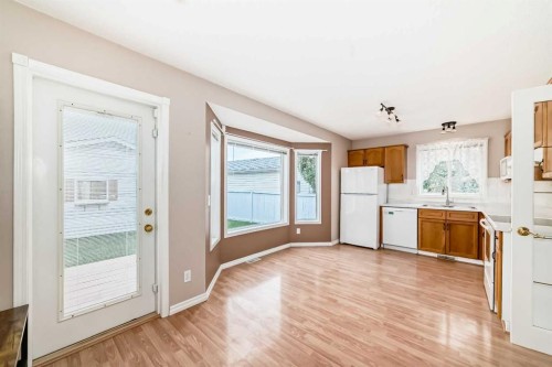 46 Coverdale Way Ne, Calgary, AB - Indoor Photo Showing Kitchen With Double Sink