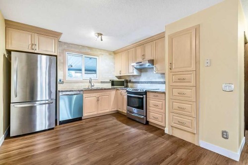 6416 28 Avenue Ne, Calgary, AB - Indoor Photo Showing Kitchen With Stainless Steel Kitchen