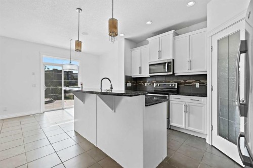309 Sage Meadows Circle Nw, Calgary, AB - Indoor Photo Showing Kitchen With Upgraded Kitchen