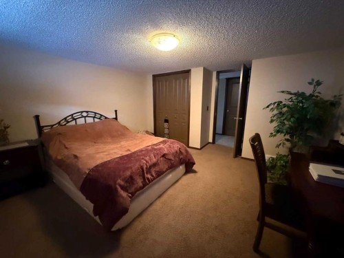 128 Chaparral Valley Drive Se, Calgary, AB - Indoor Photo Showing Bedroom