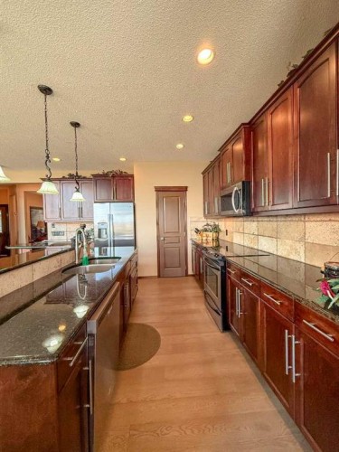 128 Chaparral Valley Drive Se, Calgary, AB - Indoor Photo Showing Kitchen With Upgraded Kitchen
