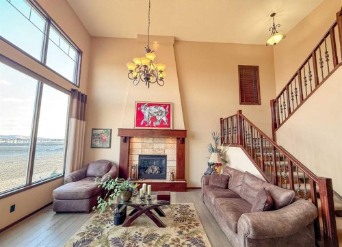 128 Chaparral Valley Drive Se, Calgary, AB - Indoor Photo Showing Living Room With Fireplace