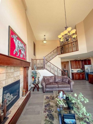 128 Chaparral Valley Drive Se, Calgary, AB - Indoor Photo Showing Living Room With Fireplace