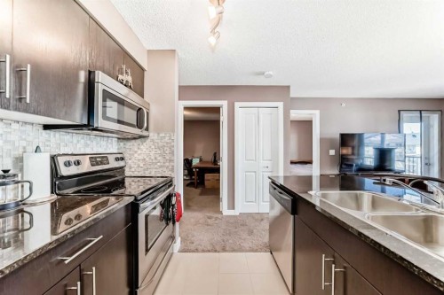 3407-81 Legacy Boulevard Se, Calgary, AB - Indoor Photo Showing Kitchen With Stainless Steel Kitchen With Double Sink With Upgraded Kitchen