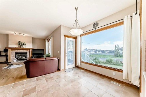 75 Hampstead Way Nw, Calgary, AB - Indoor With Fireplace