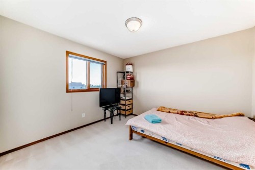 75 Hampstead Way Nw, Calgary, AB - Indoor Photo Showing Bedroom