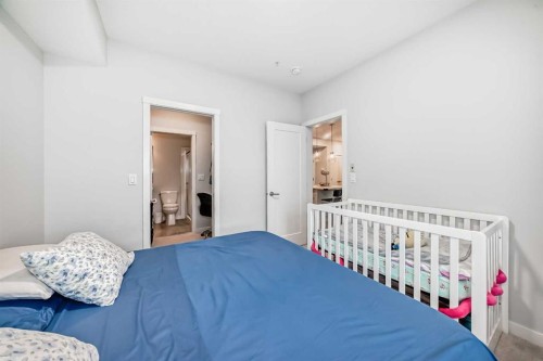 310-150 Shawnee Square, Calgary, AB - Indoor Photo Showing Bedroom