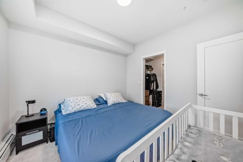 310-150 Shawnee Square, Calgary, AB - Indoor Photo Showing Bedroom