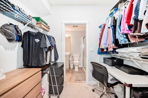 310-150 Shawnee Square, Calgary, AB - Indoor With Storage