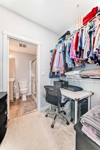 310-150 Shawnee Square, Calgary, AB - Indoor With Storage