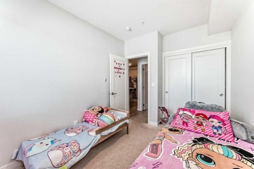 310-150 Shawnee Square, Calgary, AB - Indoor Photo Showing Bedroom