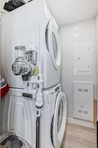 310-150 Shawnee Square, Calgary, AB - Indoor Photo Showing Laundry Room