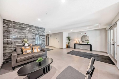 310-150 Shawnee Square, Calgary, AB - Indoor