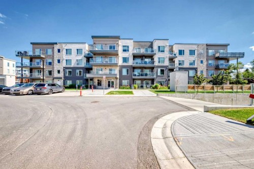 310-150 Shawnee Square, Calgary, AB - Outdoor With Balcony With Facade