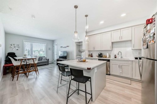310-150 Shawnee Square, Calgary, AB - Indoor