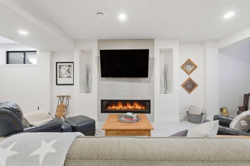 352 Coopersfield Rise Sw, Airdrie, AB - Indoor With Fireplace