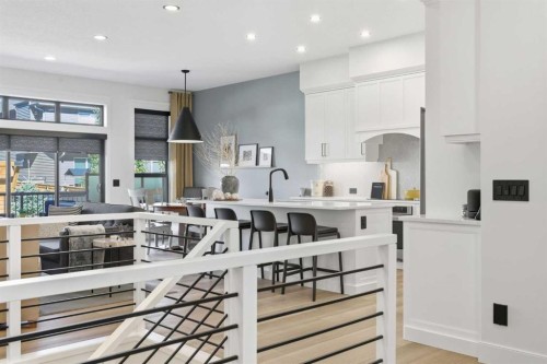 352 Coopersfield Rise Sw, Airdrie, AB - Indoor Photo Showing Kitchen With Upgraded Kitchen