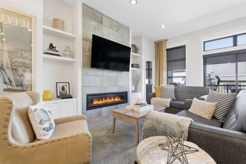 352 Coopersfield Rise Sw, Airdrie, AB - Indoor Photo Showing Living Room With Fireplace