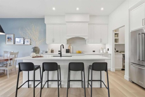 352 Coopersfield Rise Sw, Airdrie, AB - Indoor Photo Showing Kitchen With Upgraded Kitchen