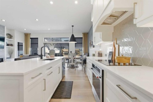 352 Coopersfield Rise Sw, Airdrie, AB - Indoor Photo Showing Kitchen With Upgraded Kitchen