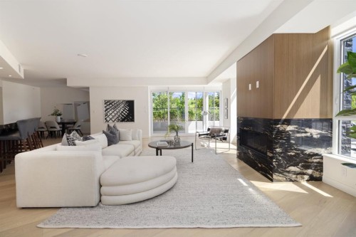 102-88 Waterfront Mews Sw, Calgary, AB - Indoor Photo Showing Living Room