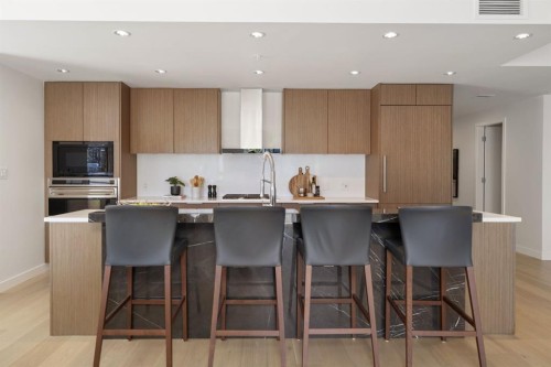 102-88 Waterfront Mews Sw, Calgary, AB - Indoor Photo Showing Kitchen