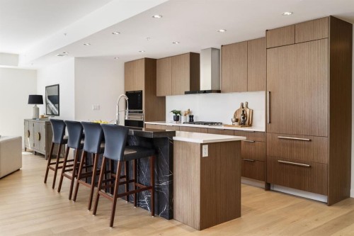 102-88 Waterfront Mews Sw, Calgary, AB - Indoor Photo Showing Kitchen With Upgraded Kitchen