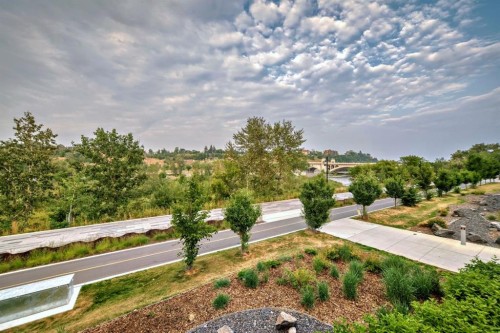 102-88 Waterfront Mews Sw, Calgary, AB - Outdoor With View