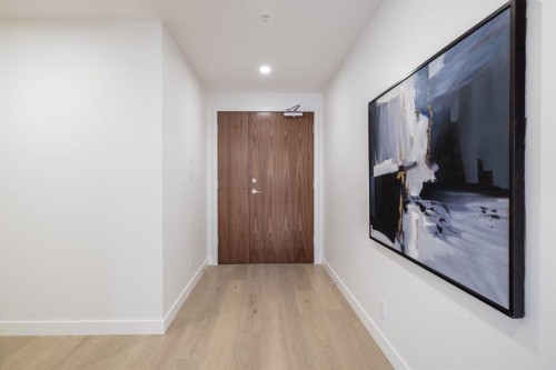 102-88 Waterfront Mews Sw, Calgary, AB - Indoor Photo Showing Other Room