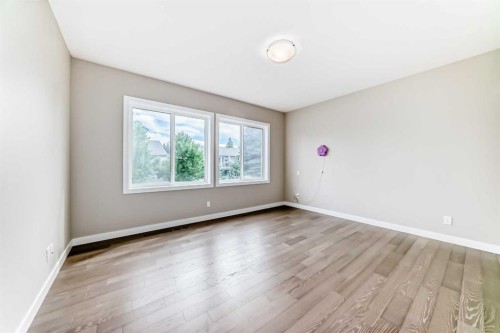 41 Shawnee Green Sw, Calgary, AB - Indoor Photo Showing Other Room