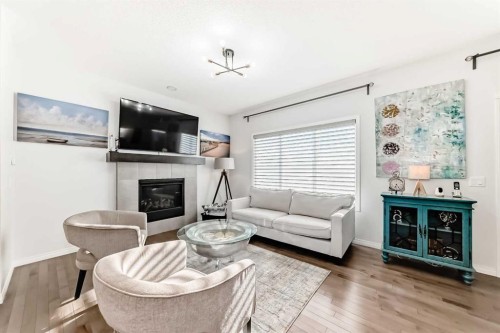 114 Walgrove Green Se, Calgary, AB - Indoor Photo Showing Living Room With Fireplace