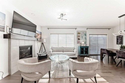 114 Walgrove Green Se, Calgary, AB - Indoor Photo Showing Living Room With Fireplace