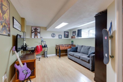 87 Falton Close Ne, Calgary, AB - Indoor Photo Showing Other Room