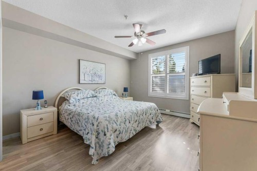 129-1 Crystal Green Lane, Okotoks, AB - Indoor Photo Showing Bedroom