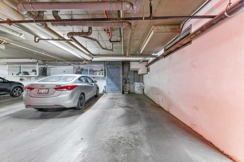 129-1 Crystal Green Lane, Okotoks, AB - Indoor Photo Showing Garage