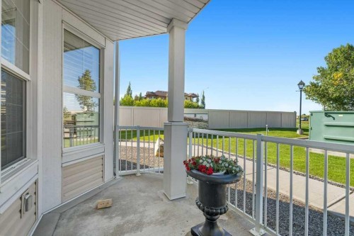 129-1 Crystal Green Lane, Okotoks, AB - Outdoor With Exterior