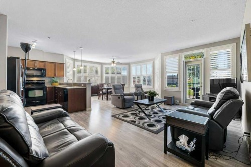 129-1 Crystal Green Lane, Okotoks, AB - Indoor Photo Showing Living Room