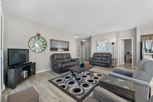 129-1 Crystal Green Lane, Okotoks, AB - Indoor Photo Showing Living Room