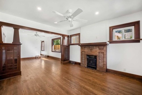 1640 15 Street Se, Calgary, AB - Indoor With Fireplace