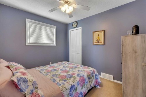 164 Covepark Close Ne, Calgary, AB - Indoor Photo Showing Bedroom