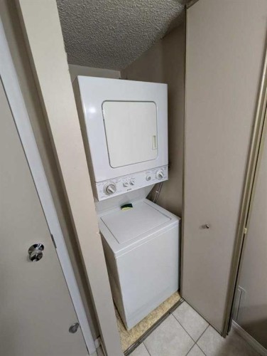 703-1202 13 Avenue Sw, Calgary, AB - Indoor Photo Showing Laundry Room