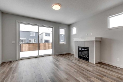 435 Rivercrest Road, Cochrane, AB - Indoor Photo Showing Living Room With Fireplace