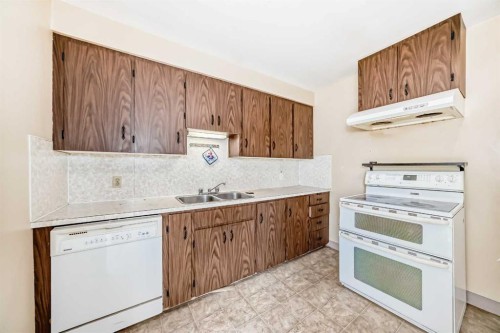 2809 38 Street Sw, Calgary, AB - Indoor Photo Showing Kitchen With Double Sink