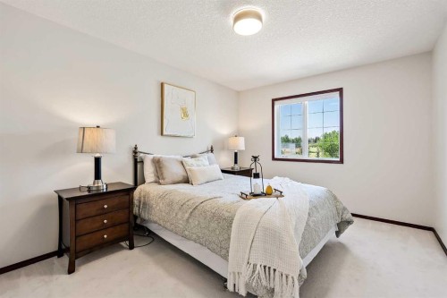 10417 Hamptons Boulevard Nw, Calgary, AB - Indoor Photo Showing Bedroom