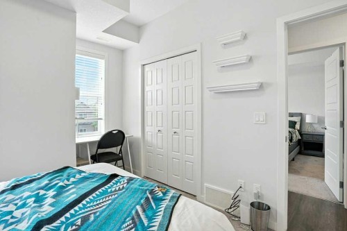 123-115 Sagewood Drive Sw, Airdrie, AB - Indoor Photo Showing Bedroom