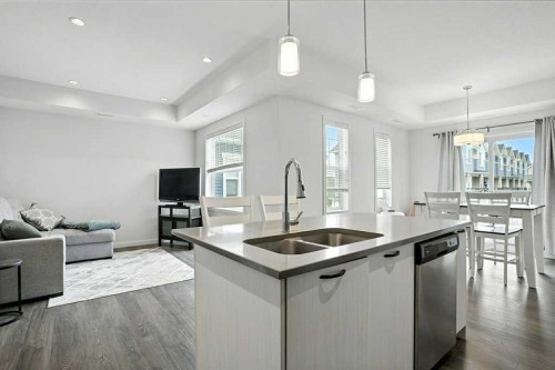 123-115 Sagewood Drive Sw, Airdrie, AB - Indoor Photo Showing Kitchen With Double Sink With Upgraded Kitchen