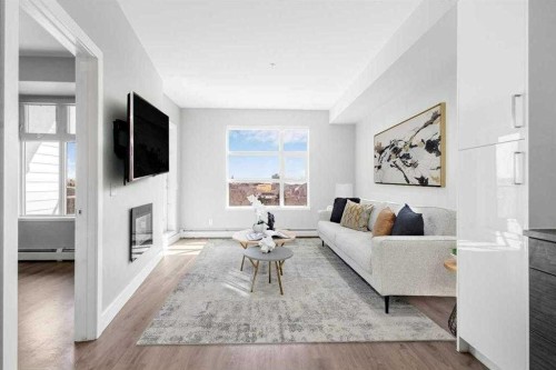 515 4 Avenue Ne, Calgary, AB - Indoor Photo Showing Living Room With Fireplace