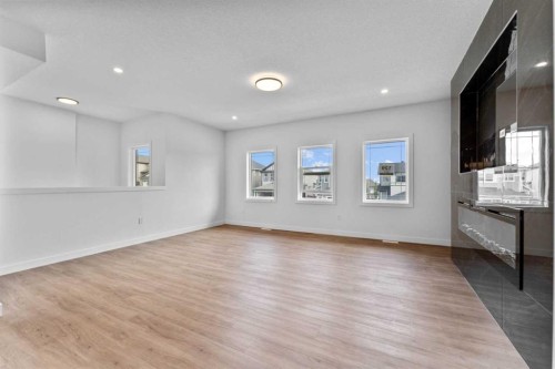129 Heritage Boulevard, Cochrane, AB - Indoor Photo Showing Other Room