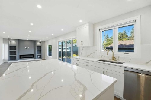 227 Parkside Way Se, Calgary, AB - Indoor Photo Showing Kitchen With Double Sink With Upgraded Kitchen